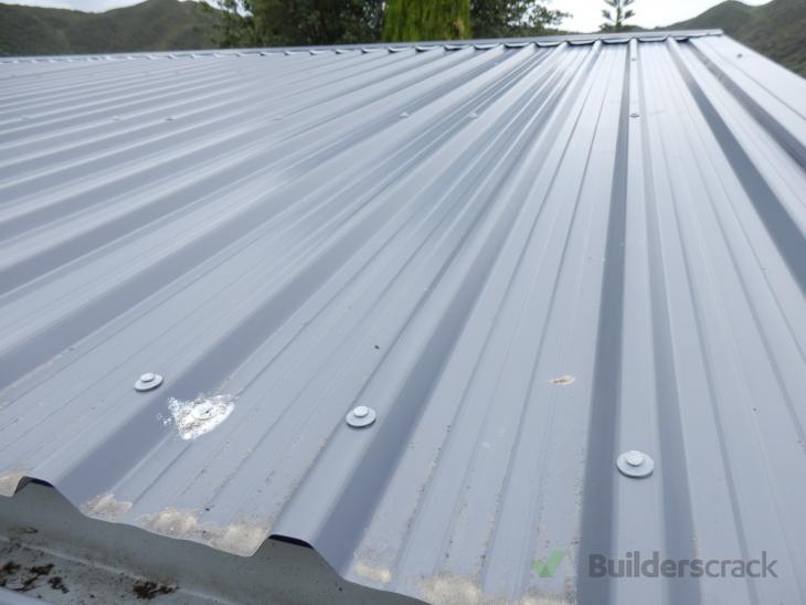 Replace one sheet of 6 rib roofing iron for a Versatile garage