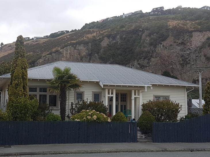 Iron roof. Clean. Repair. Paint. Sumner