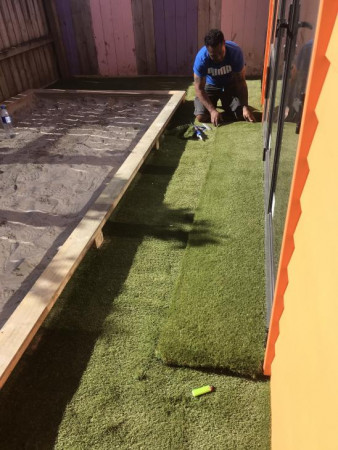 Sandpit and artificial grass