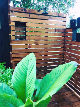 Outdoor shower build in Rarotonga Airbnb unit.