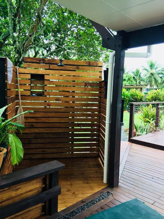 Outdoor shower build in Rarotonga Airbnb unit.