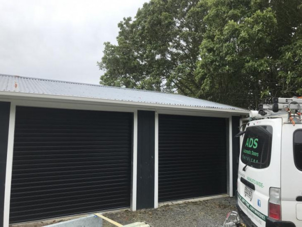 Merlin Motorised Twin roller doors in Ebony