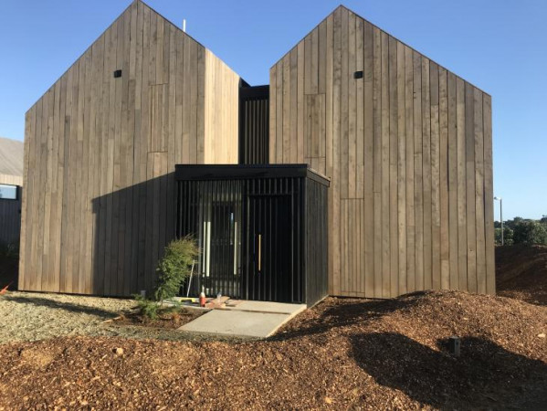 New cottage with eco style clad