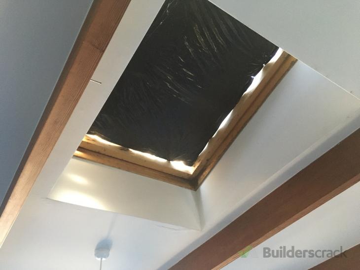 Install new skylights above kitchen and remove 3 leaking skylights