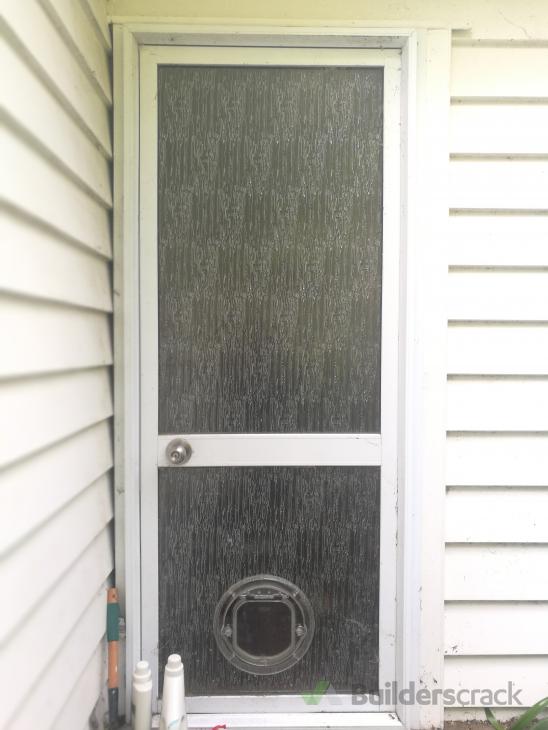 Dog door installation ( 526641) Builderscrack