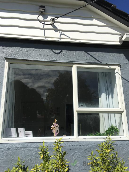 Stripping and painting peeling aluminium window frames whole house