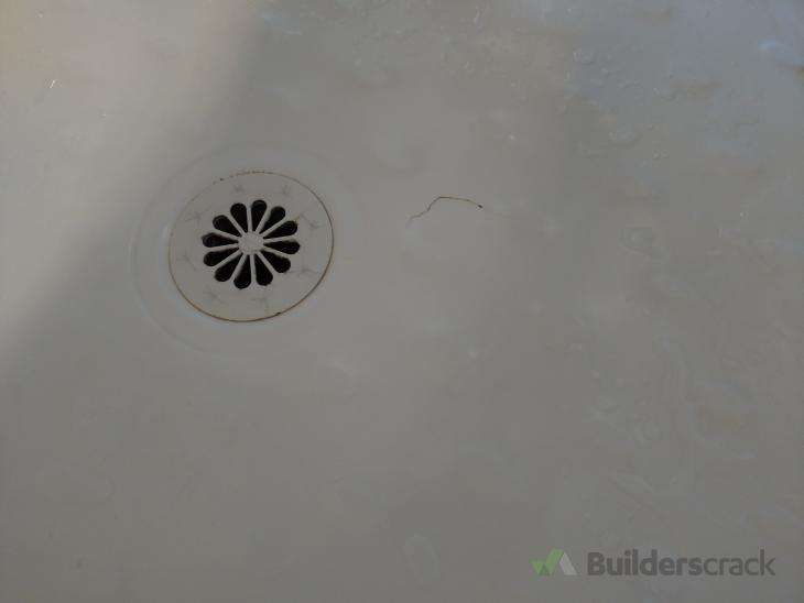 Crack in shower floor ( 532360) Builderscrack