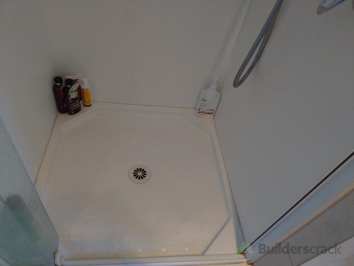 Crack in shower floor ( 532360) Builderscrack