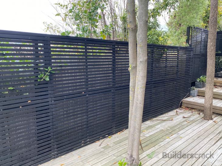 Extend height of fence by 0.5m (approx.) and add trellis over 4m length