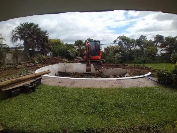 Demolition of fibre swimming pool -early stage