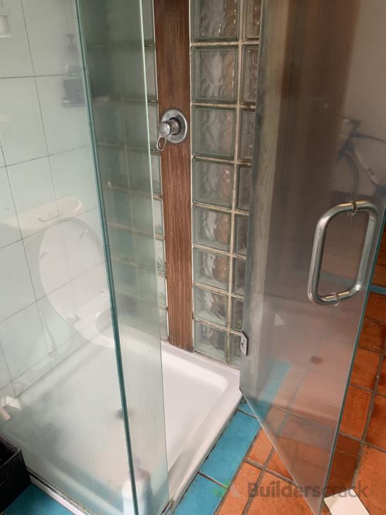 Reseal glass brick shower, replace timber piece ( 553553) Builderscrack