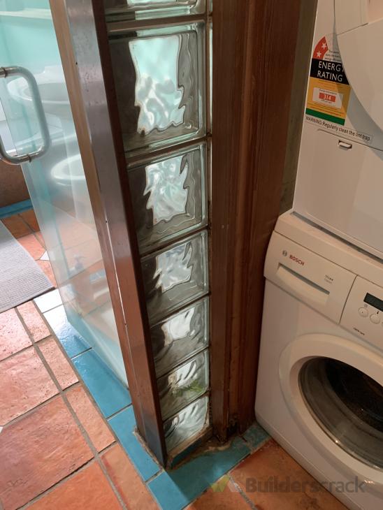 Reseal glass brick shower, replace timber piece ( 553553) Builderscrack
