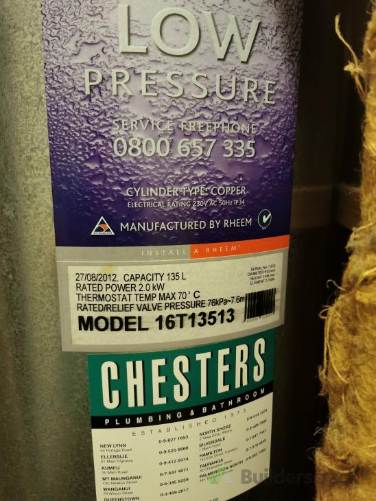 Water dripping from overflow pipe on the roof from the hot water