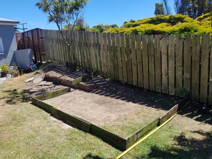 concrete pad for shed, small retaining wall & three steps