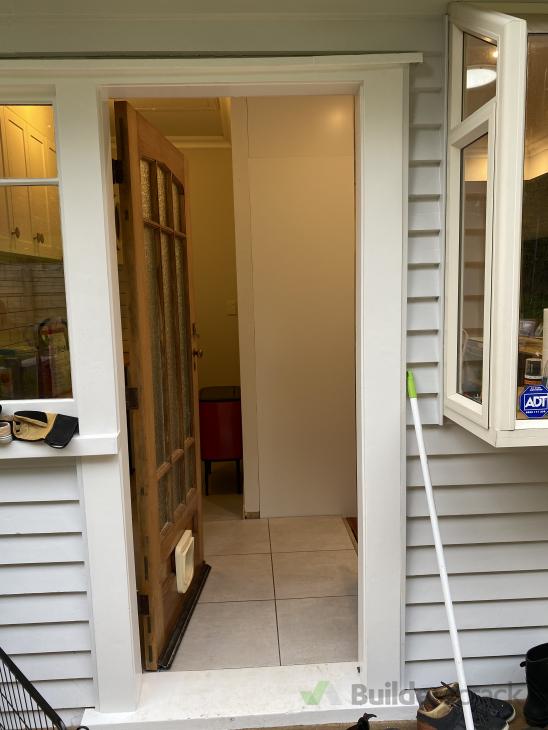 Install bifold timber window, flip exterior door, install