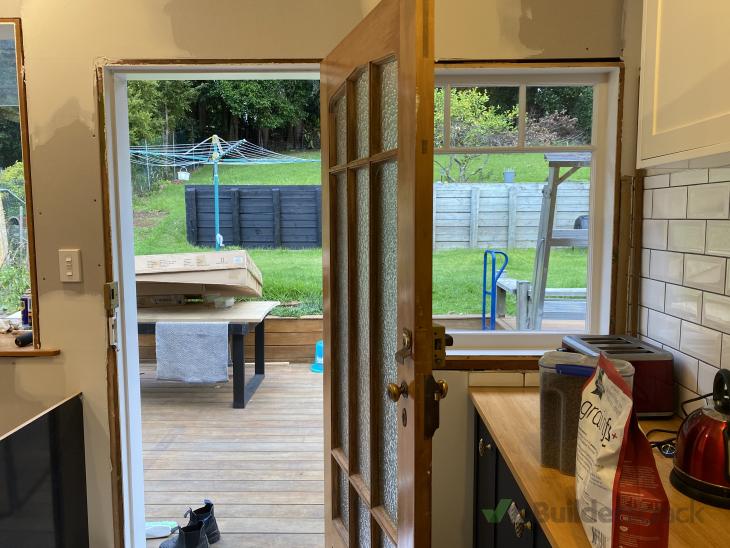 Install bifold timber window, flip exterior door, install