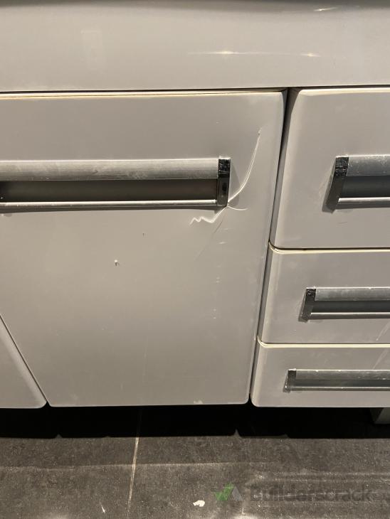 Crack in bathroom door vanity ( 624039) Builderscrack