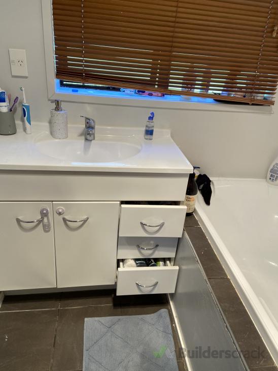 Replace bathroom vanity, fix silicone and small amount of tiling