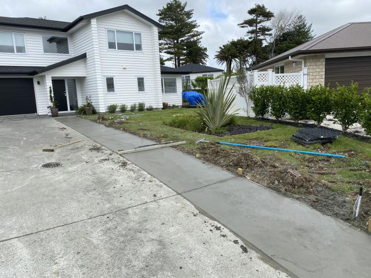 Extended concrete driveway finishing stage