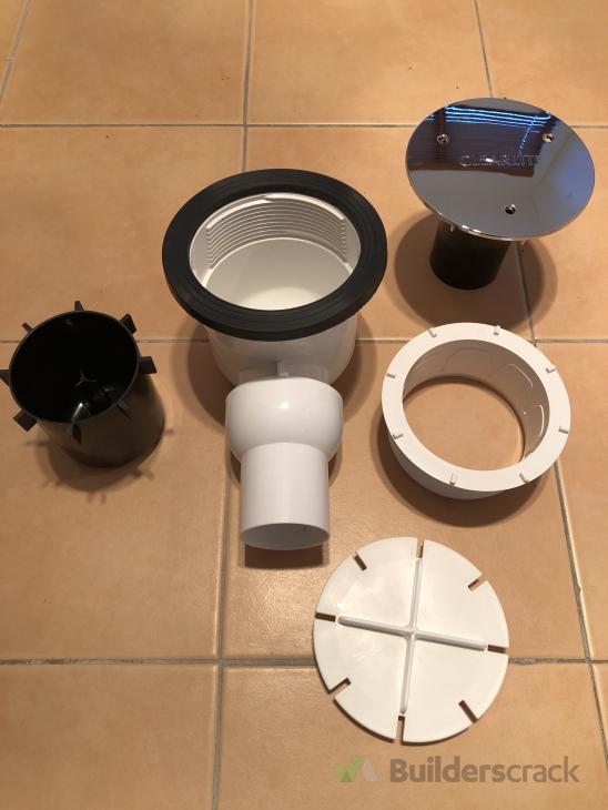 Replace waste trap under shower tray ( 680034) Builderscrack