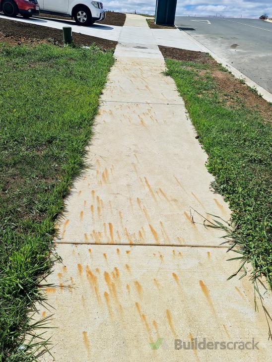 Remove Fertilizer Rust stains from new Concrete Driveway and paths