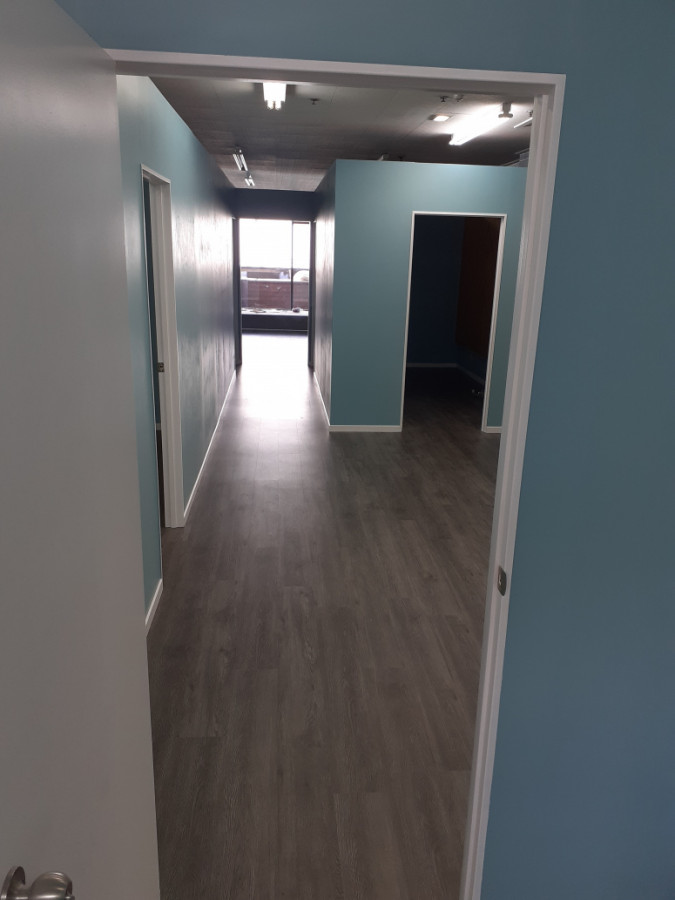 Office partitioning, laminate floor planks and painting