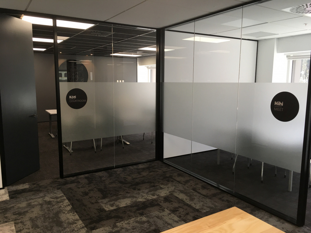 Albert St city office fitout including these rooms built with aluminium extrusion, steel studs, gib board and full height glass