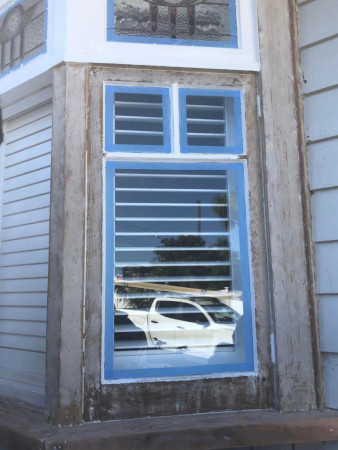 Stripping back old window paint, sanding, ready for primer and top coats