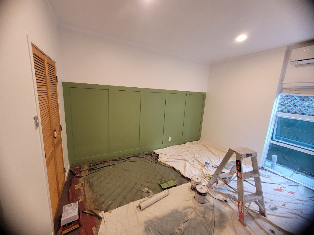 Building a green bed headboard on wall and total room painting