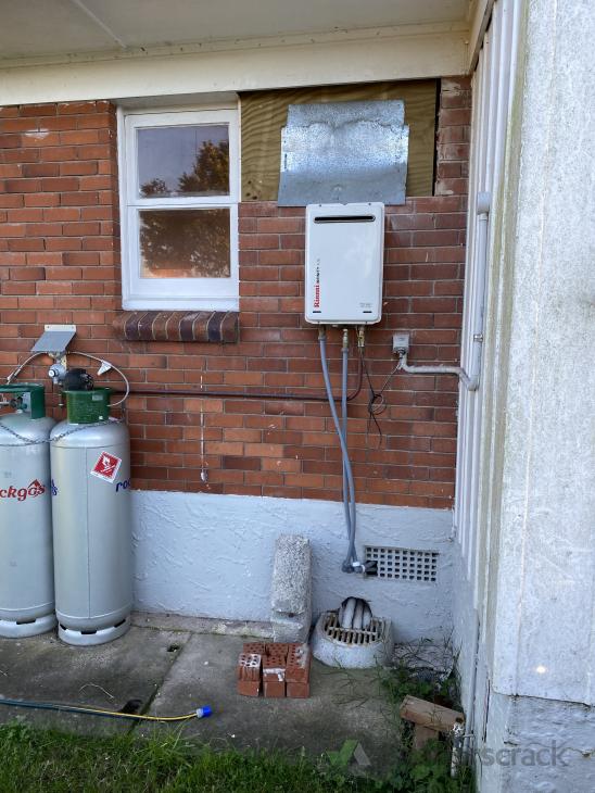 Moving Hot Water Califont on External wall ( 751218) Builderscrack