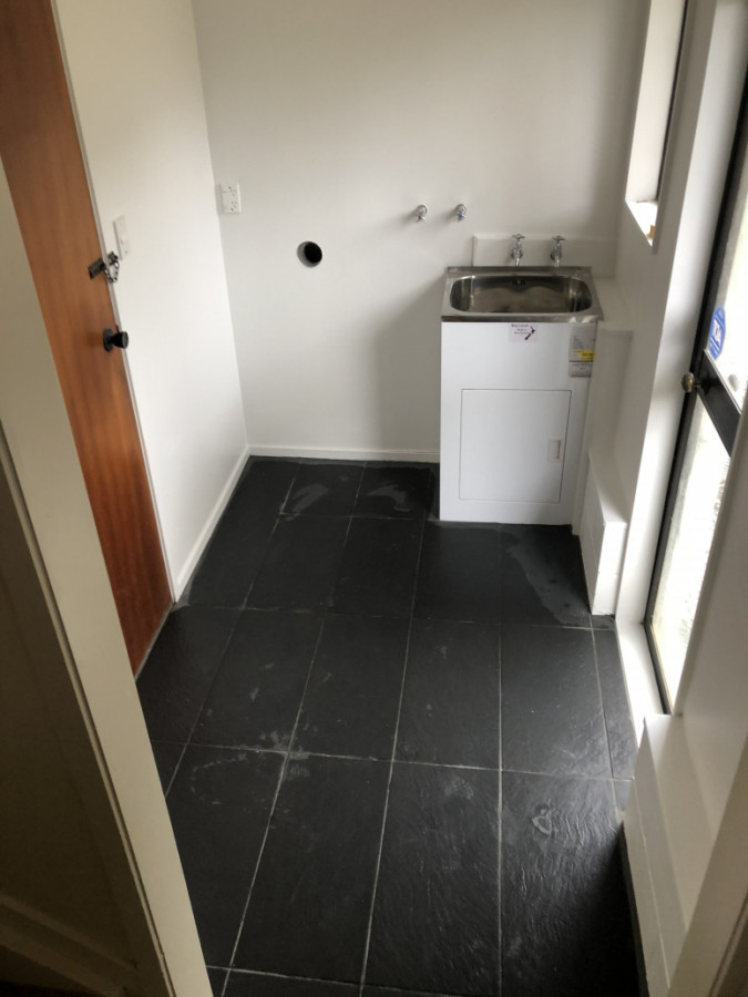 Afterwards with tiles laid ,knew sink and repainted